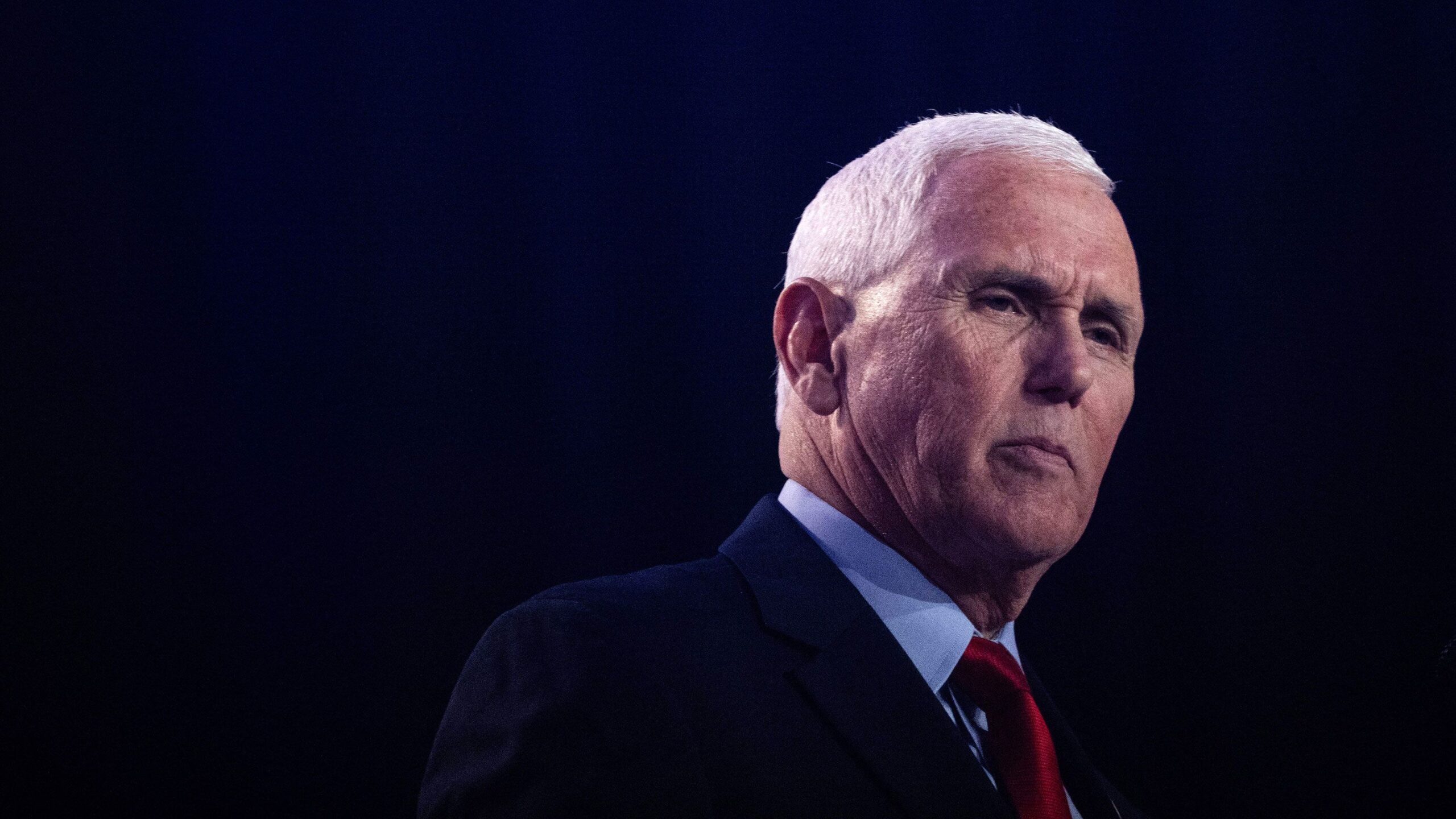 Former Vice President Mike Pence, seen here on September 15, has run up debt in his bid for the Whi...