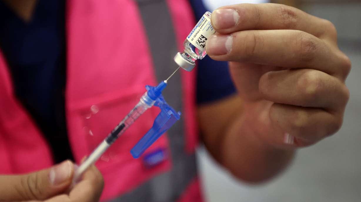 A Salt Lake County woman filed a lawsuit claiming a COVID-19 vaccine dose five-times larger than th...