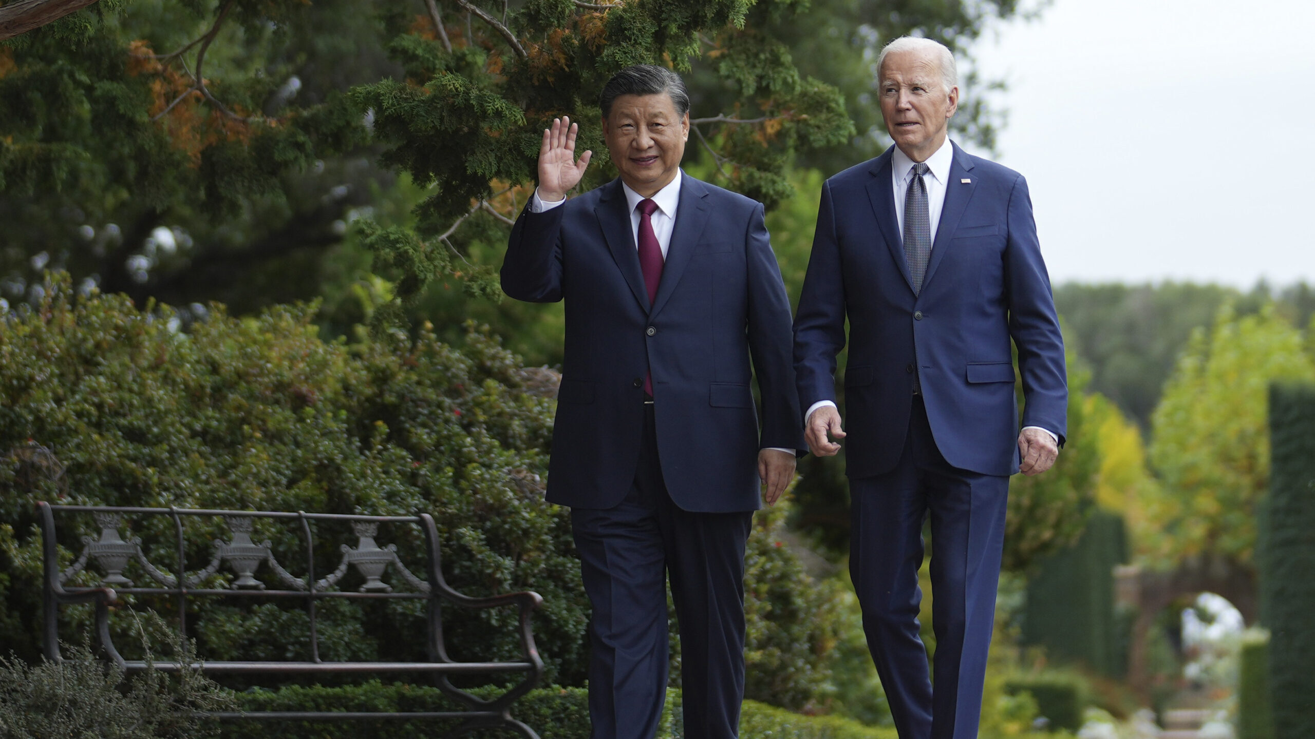 President Joe Biden and China's President President Xi Jinping walk in the gardens at the Filoli Es...