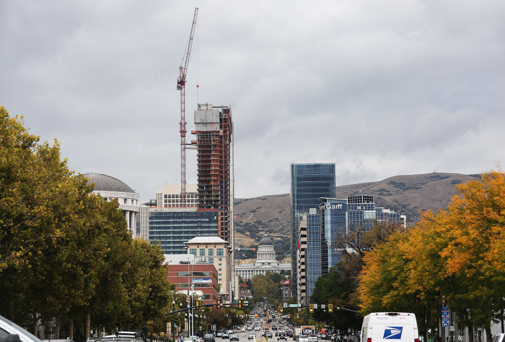 Building construction continues with a crane in downtown Salt Lake City on Tuesday, Oct. 3, 2023.  ...