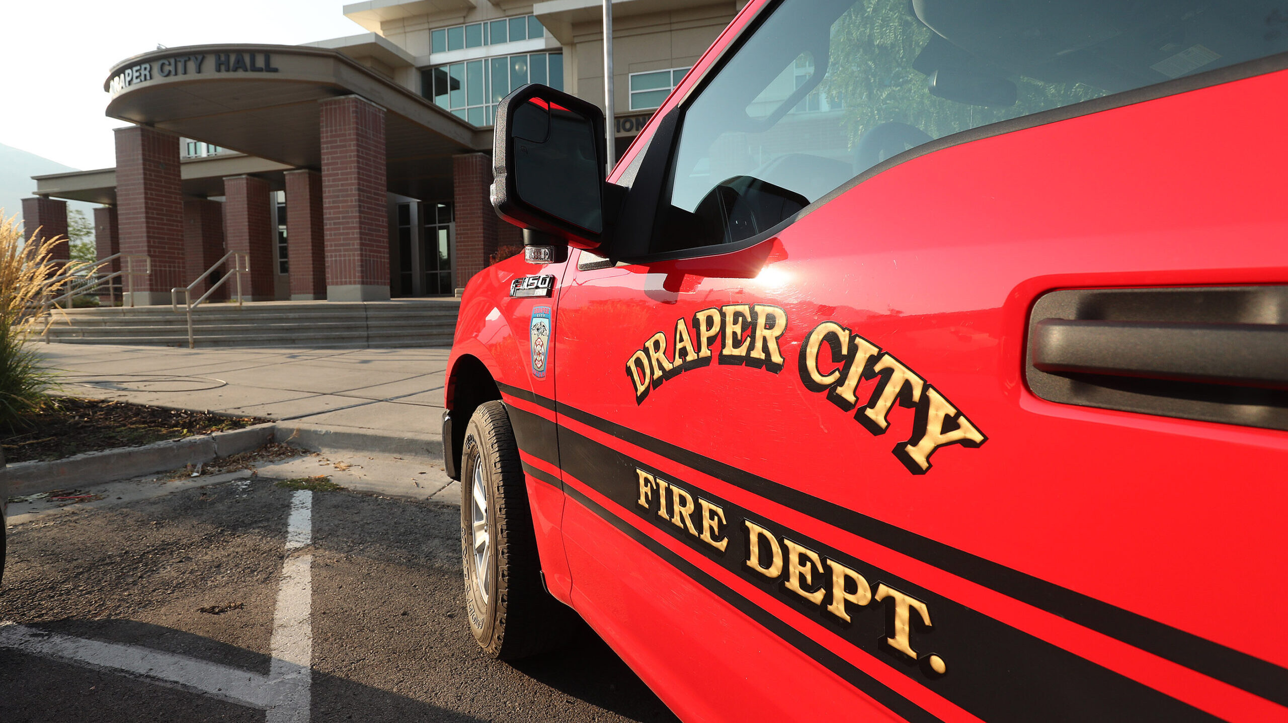 The Draper City Fire Battalion Chief's vehicle is parked outside Draper City Hall in Draper. a Carb...