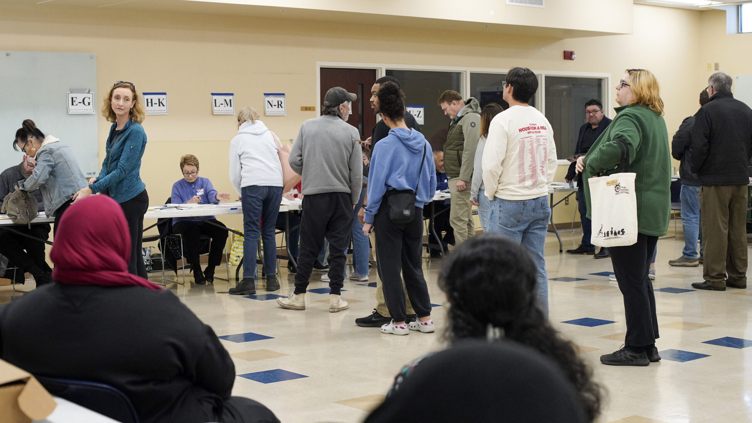 Voters check-in at a polling location on November 7, 2023 in Columbus, Ohio. 2023 Voters passed Ohi...