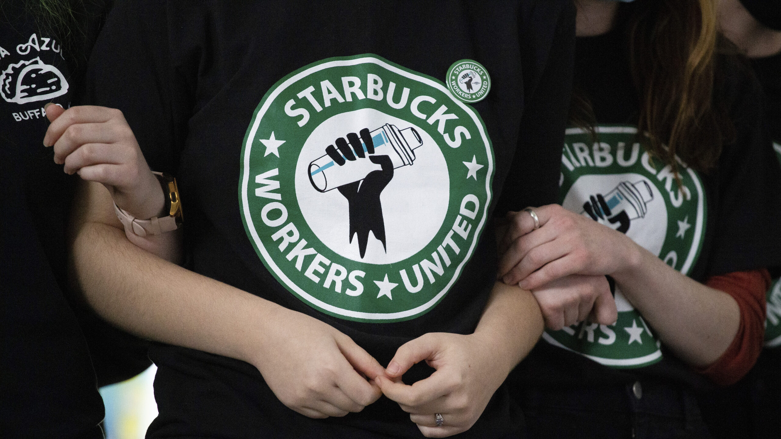 starbucks workers wear shirts from starbucks workers union...