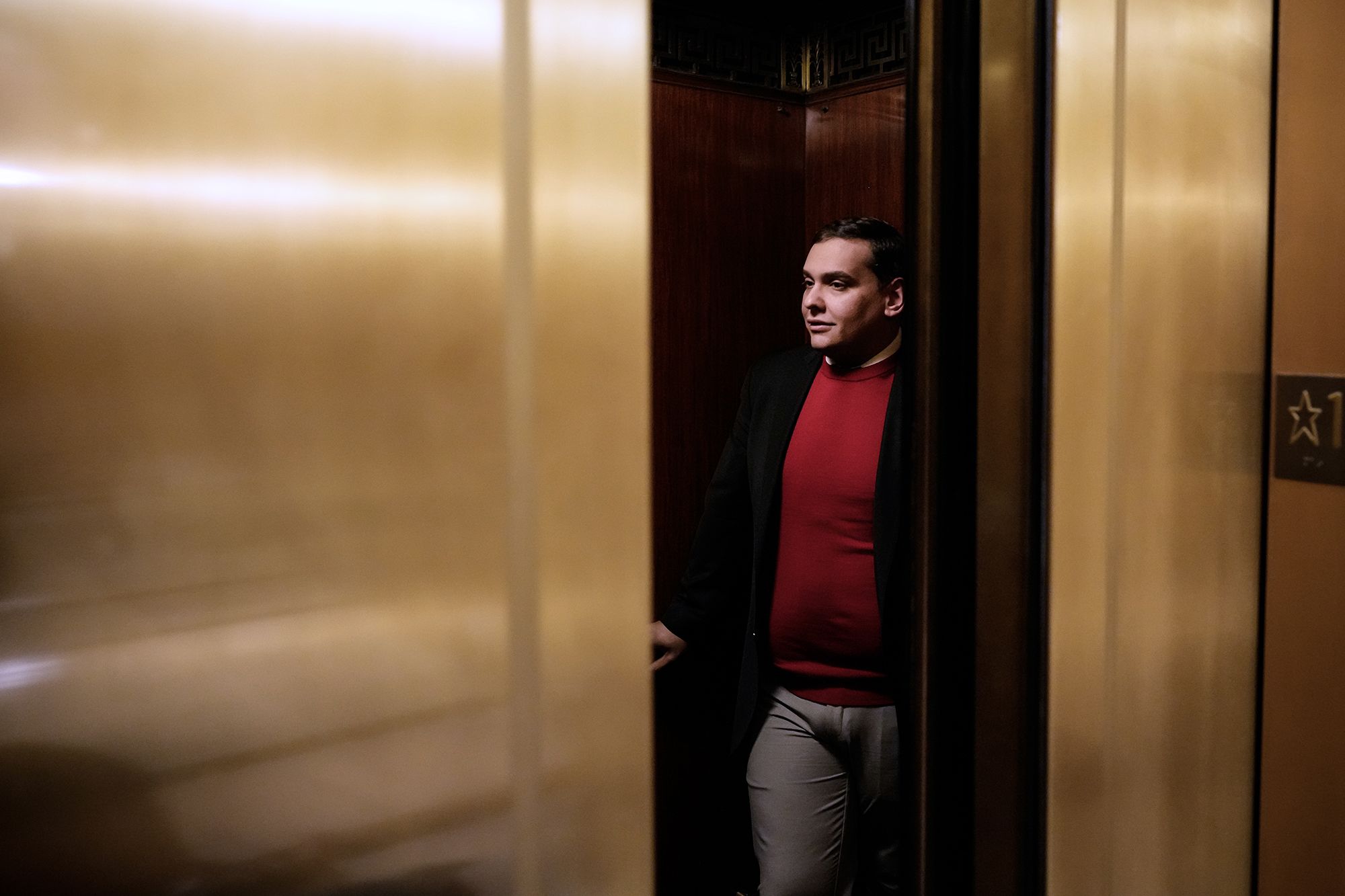 Republican Rep. George Santos of New York rides an elevator at the US Capitol on November 1, in Was...