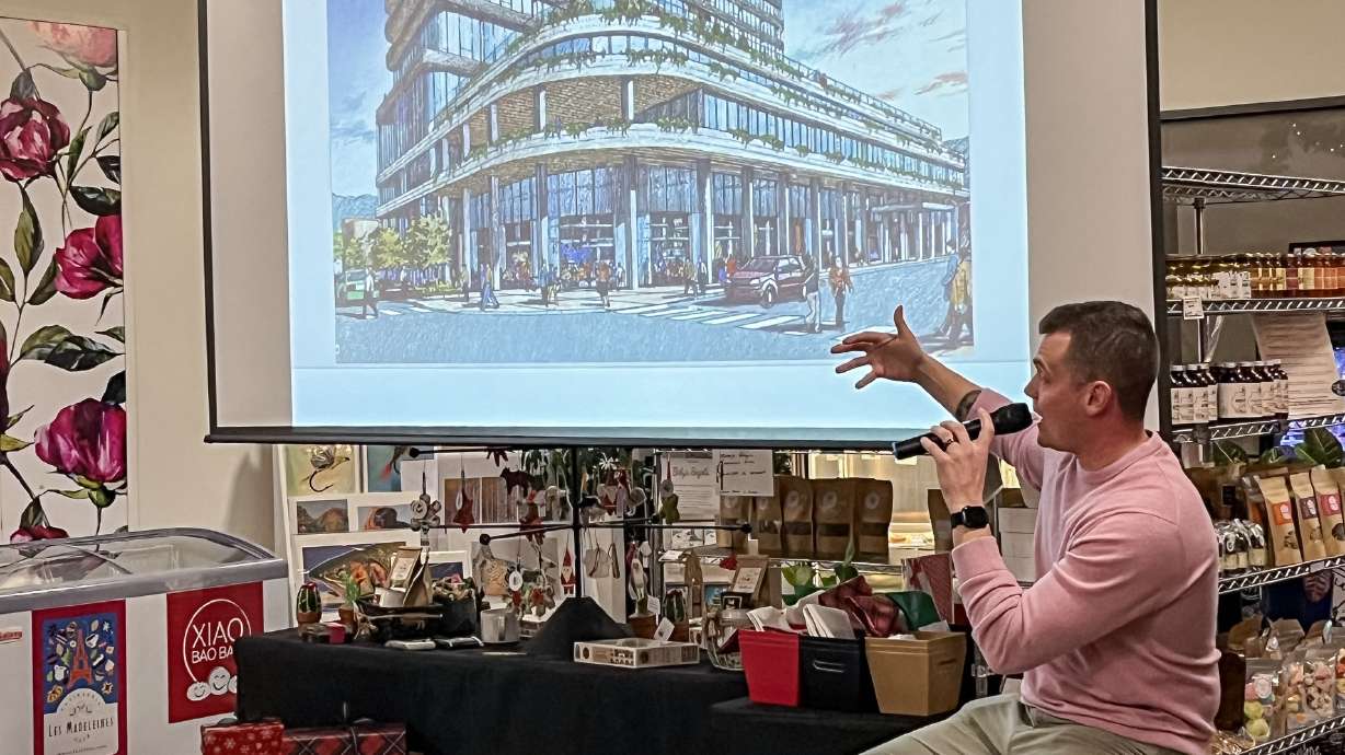 Dan Whalen, vice president of design and development for Harbor Bay Ventures, shows a rendering of ...