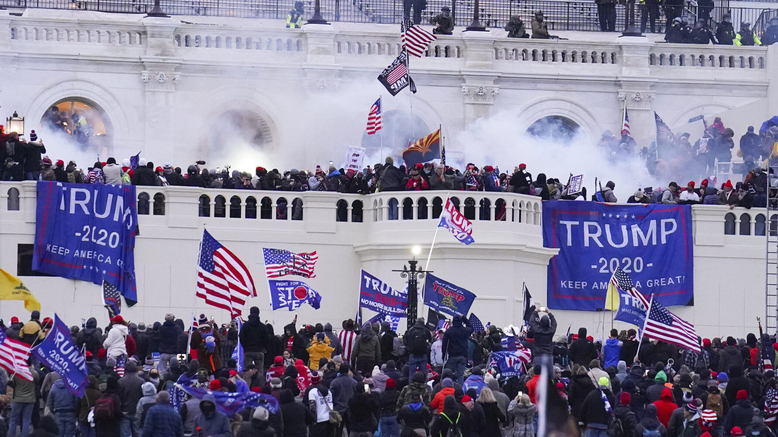 Image of January 6 Capitol rioters shown. A Payson, Utah, man is being charged with assault during ...