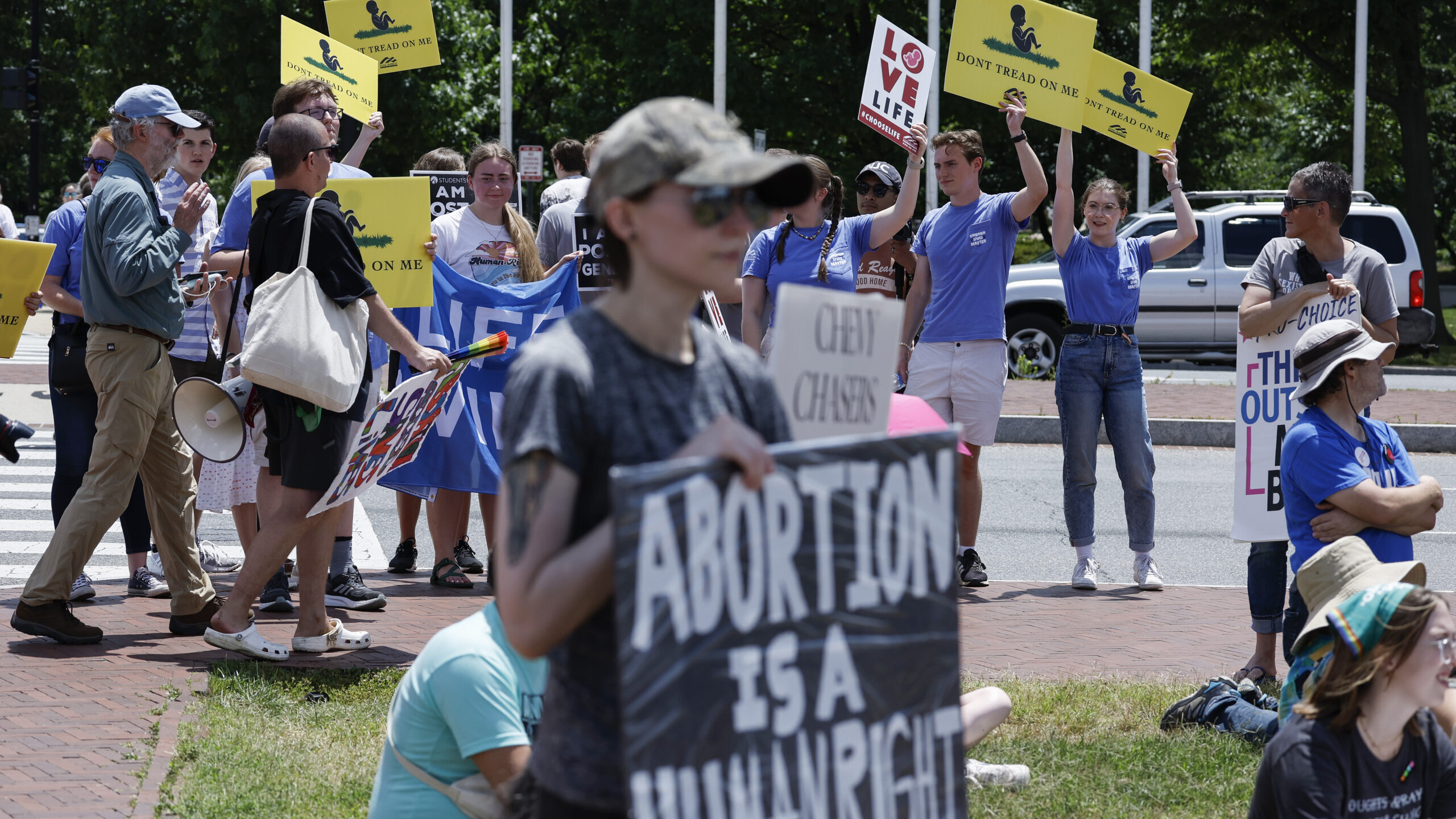 FILE: Anti-abortion activists protest near a Women's March rally on June 24, 2023 in Washington, DC...