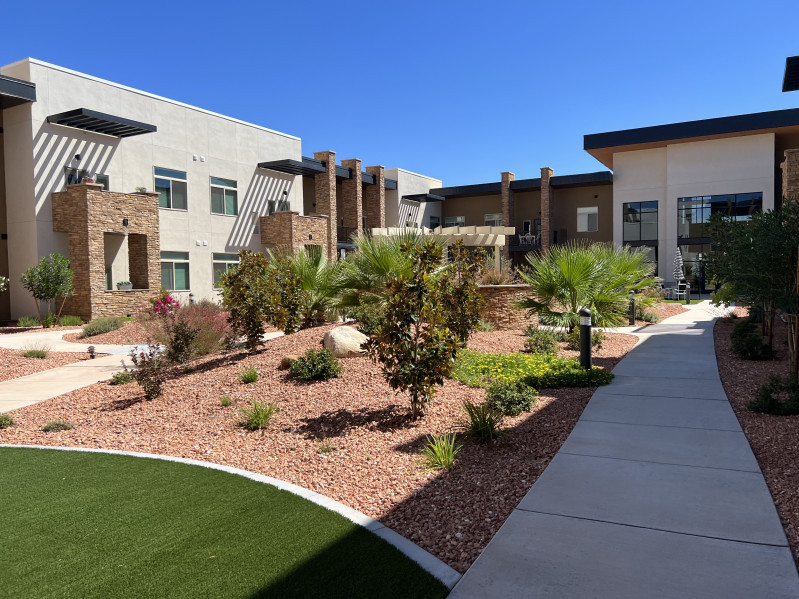 These photos of Legacy Village in St. George, Utah, show zero land dedicated to real grass. It incl...