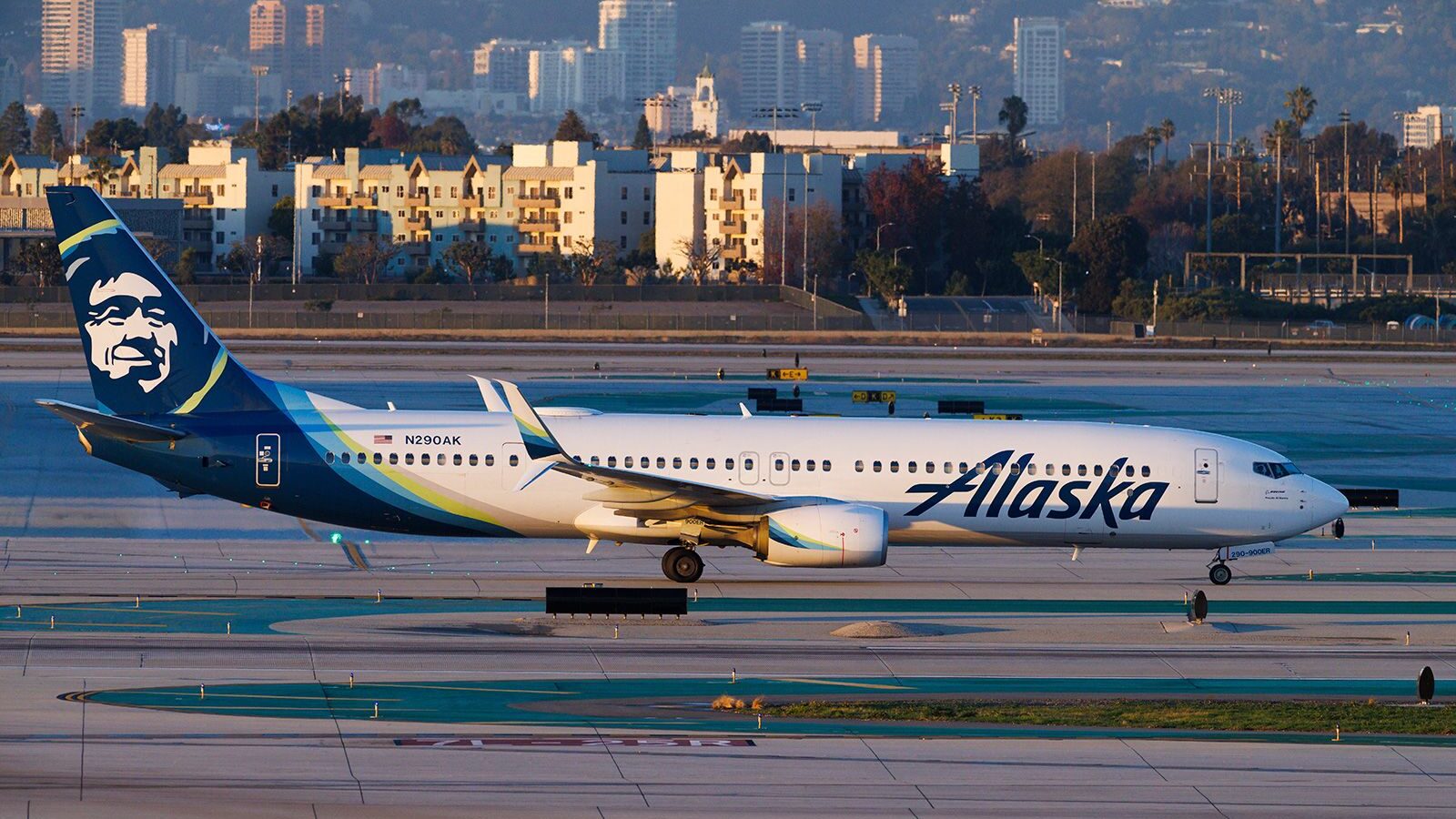 Image of an Alaska Air flight taking off from Los Angeles International Airport. The FAA convened a...