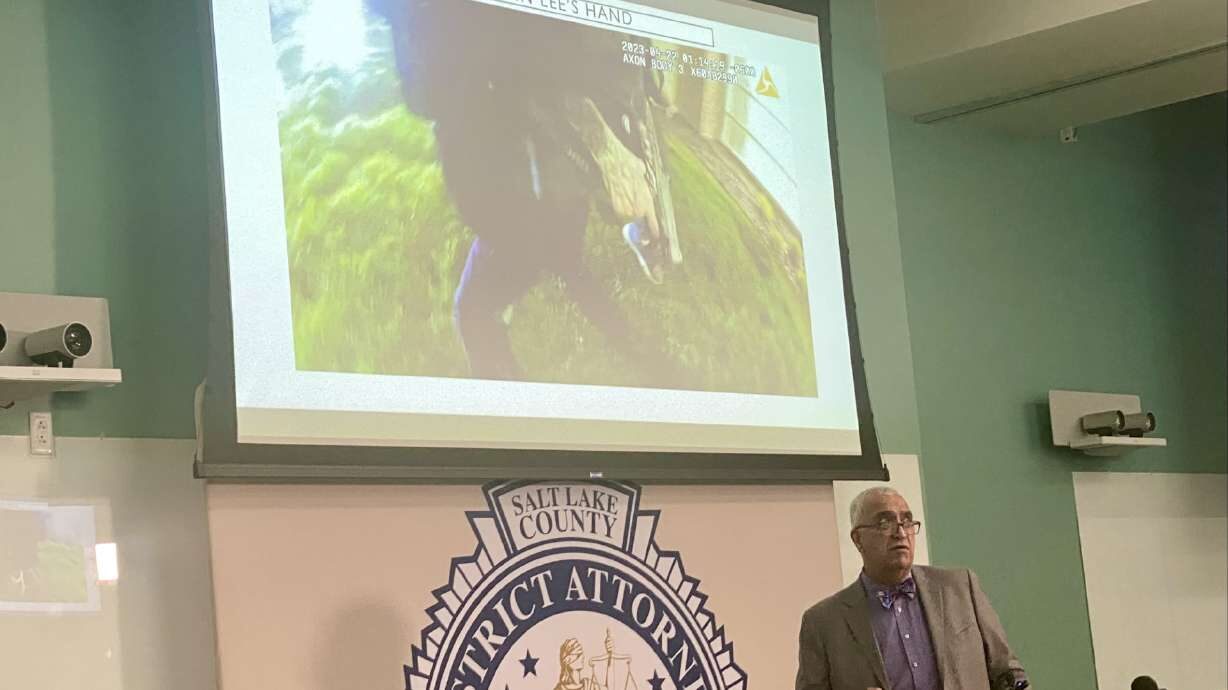 Salt Lake County District Attorney Sim Gill shows body camera video Friday while explaining why he ...
