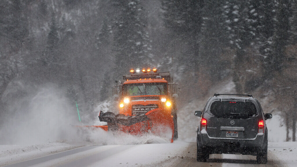 A snowplow clears the road in Big Cottonwood Canyon on Friday, Dec. 1, 2023. With the return of win...
