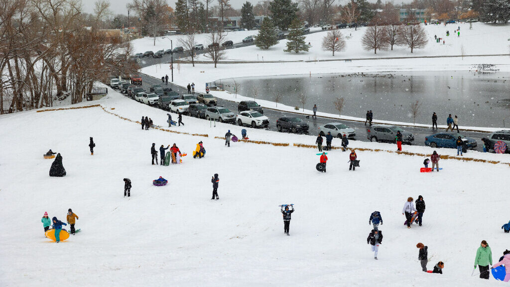 Sledders at Sugar House Park in Salt Lake City on Sunday, Jan. 7, 2024. Winter storms hit the Wasat...