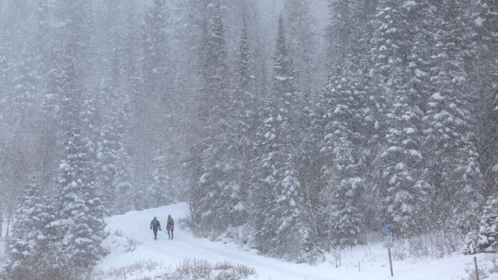 People hike to Donut Falls in Big Cottonwood Canyon on Friday, Dec. 1, 2023....