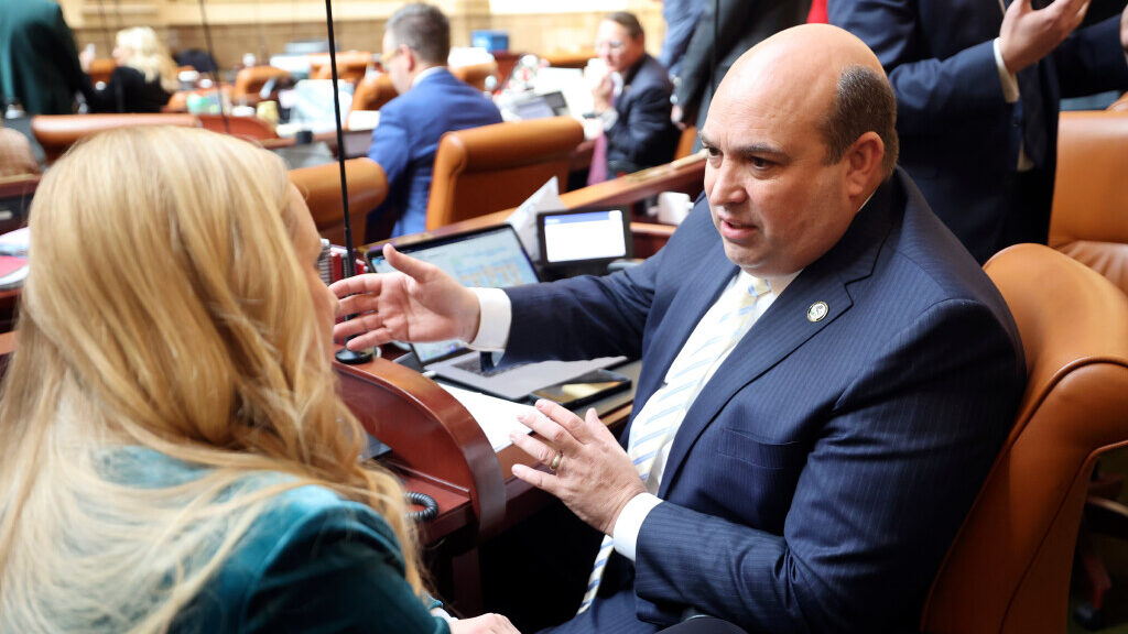 Rep. Candice Pierucci, R-Herriman, talks with Rep. Walt Brooks, R-St. George, on the first day of t...