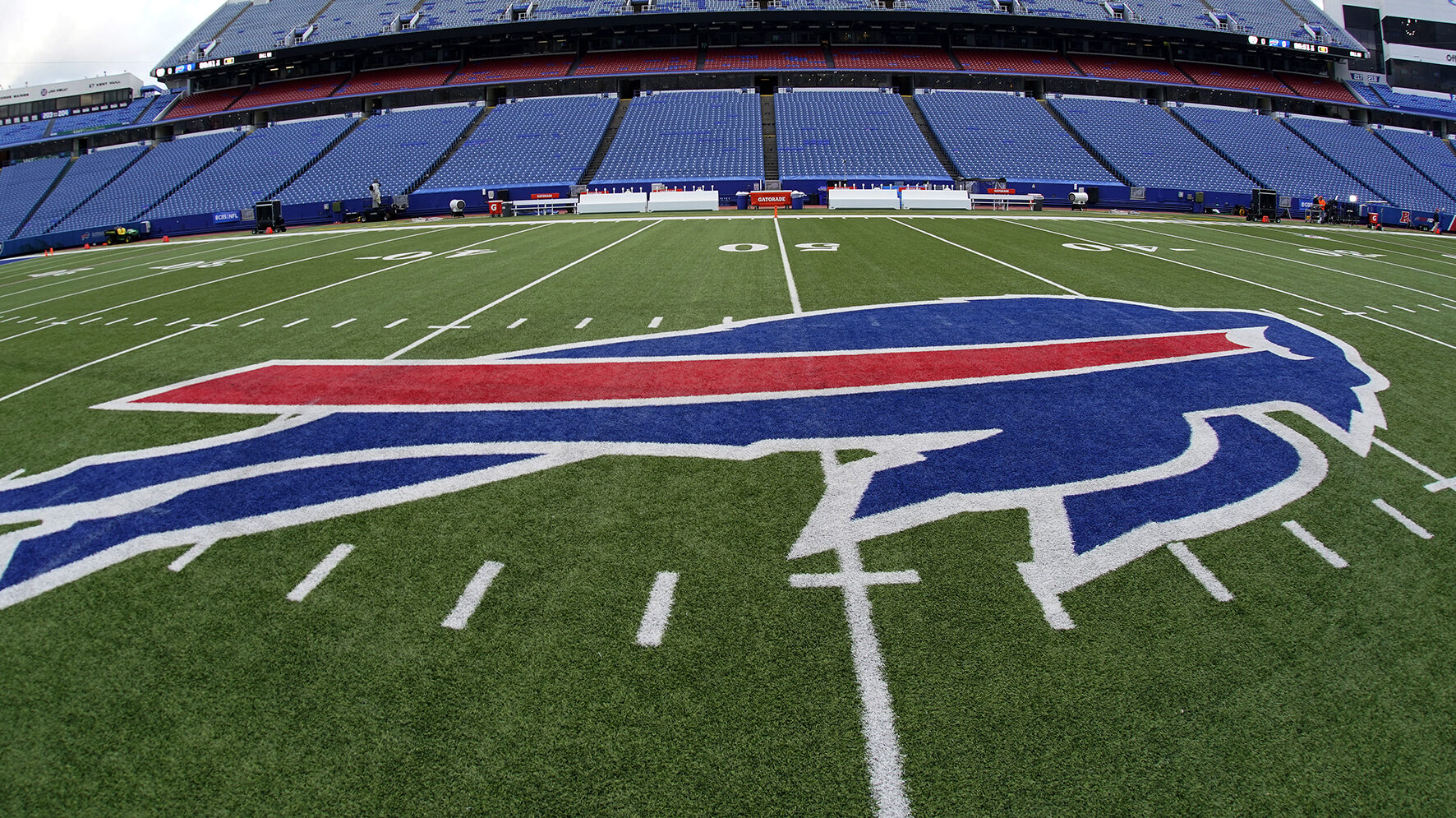 The Buffalo Bills logo is displayed opn the field at Highmark Stadium before an NFL football game b...
