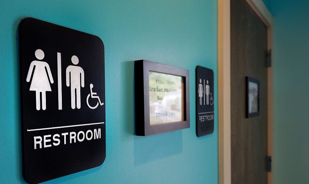 DURHAM, NC - MAY 10: Unisex signs hang outside bathrooms at Toast Paninoteca on May 10, 2016 in Dur...