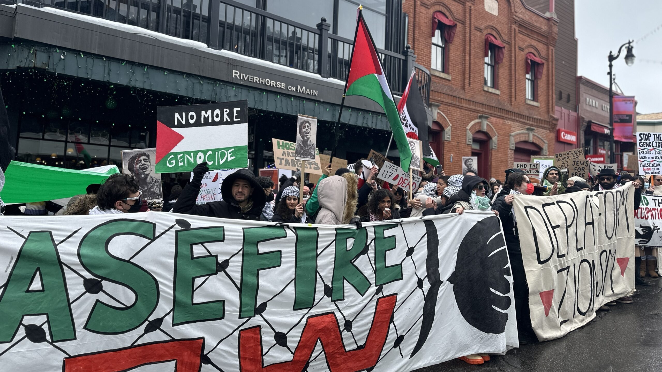 Dozens of Pro-Palestinian supporters filled Main Street in Park City Sunday afternoon during Sundan...
