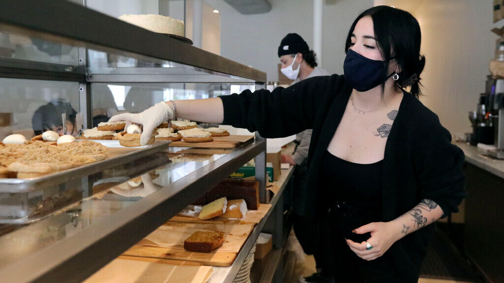 Raquel Martinez, Tulie Bakery barista and baker, pulls an order for a customer at Tulie Bakery in S...