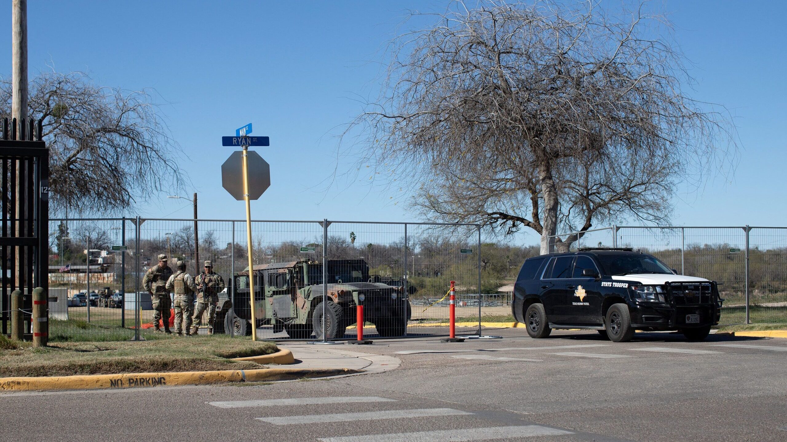 Texas National Guard troops control who enters and exits Shelby Park at the US-Mexico border in Eag...