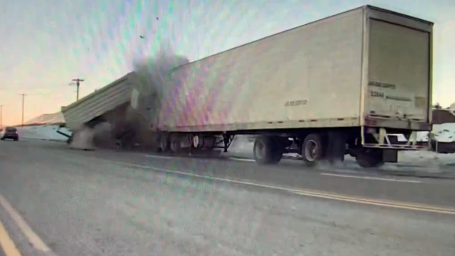 Screengrab of a video showing a semitruck crashing into a dump truck in Lehi, Utah, on Tuesday morn...