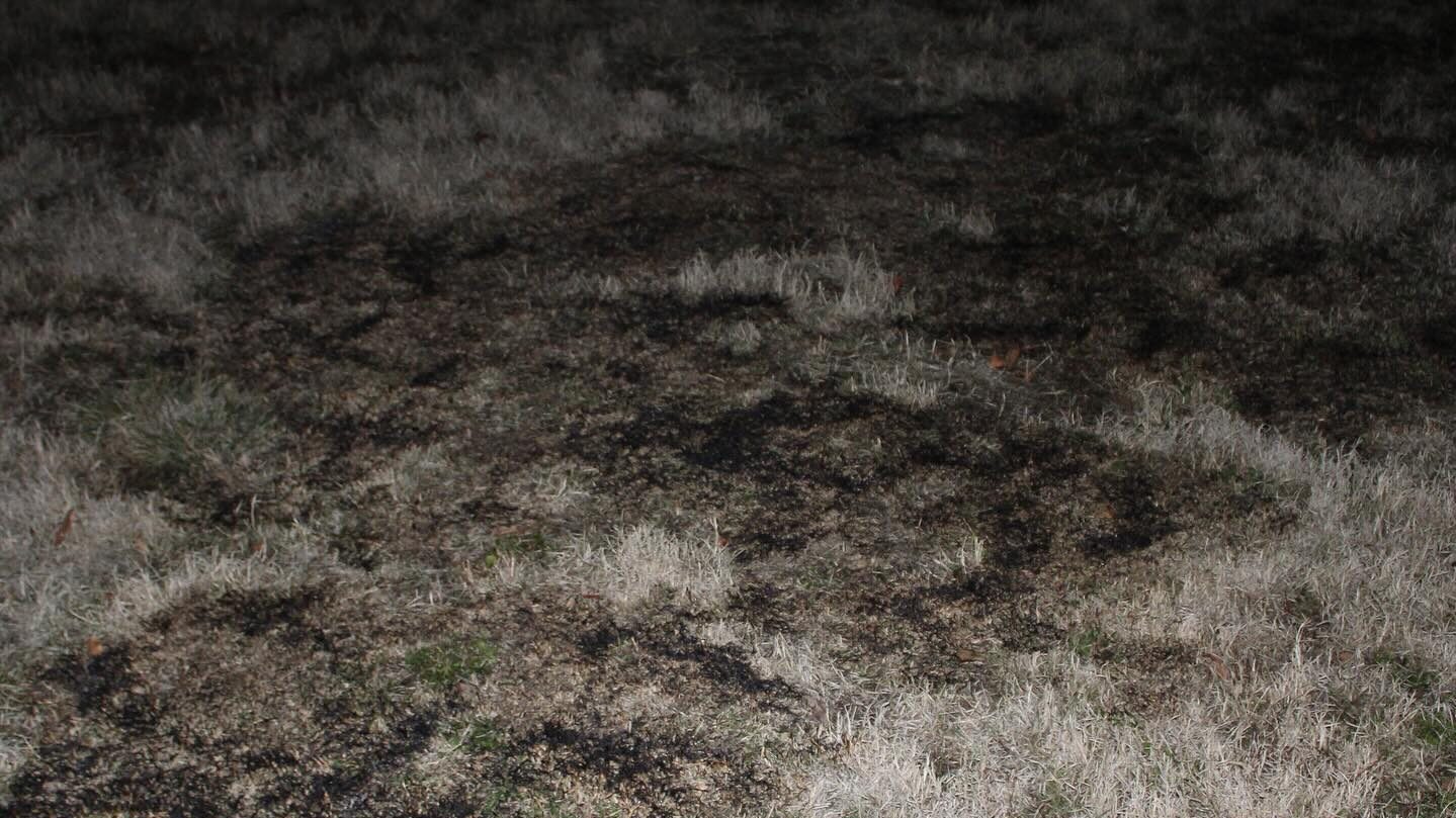 Areas of yard burned after boy caught on fire. (Hurricane Valley Fire & Rescue)...