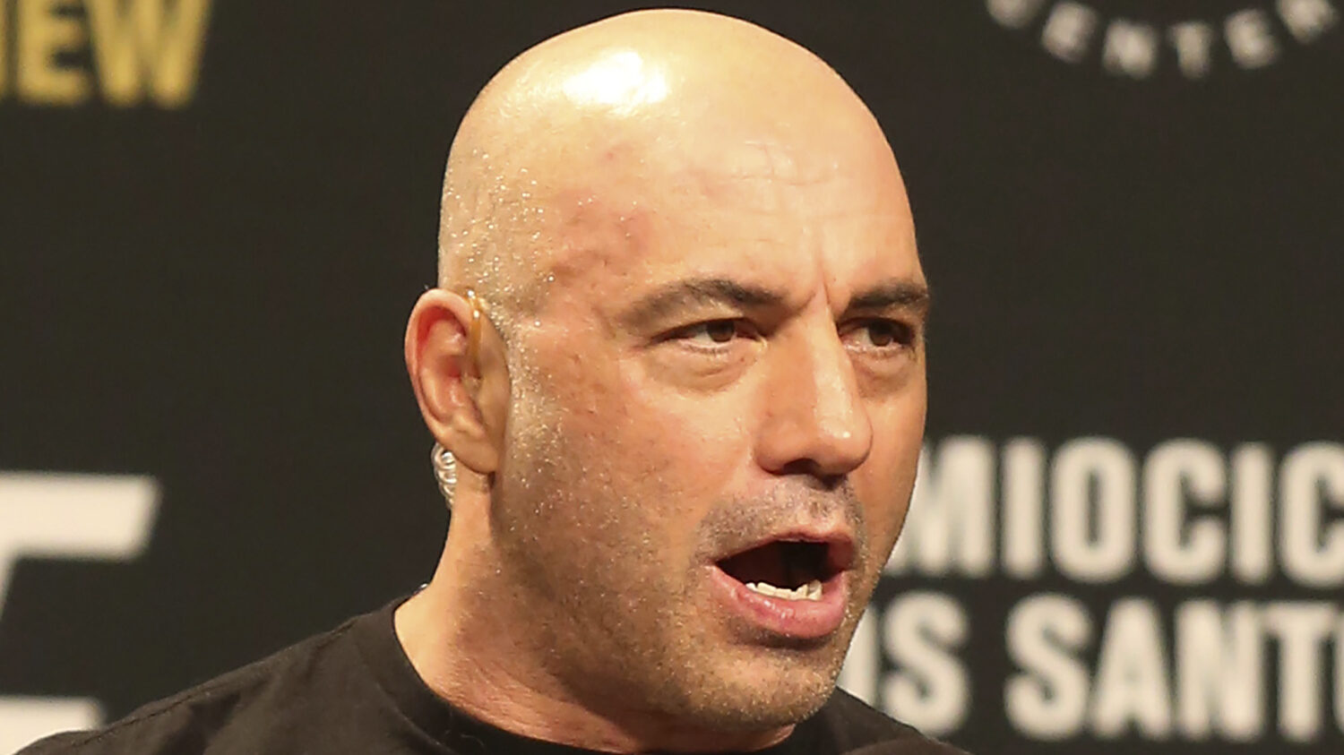 FILE - Joe Rogan is seen during a weigh-in before UFC 211 on Friday, May 12, 2017, in Dallas. Spoti...