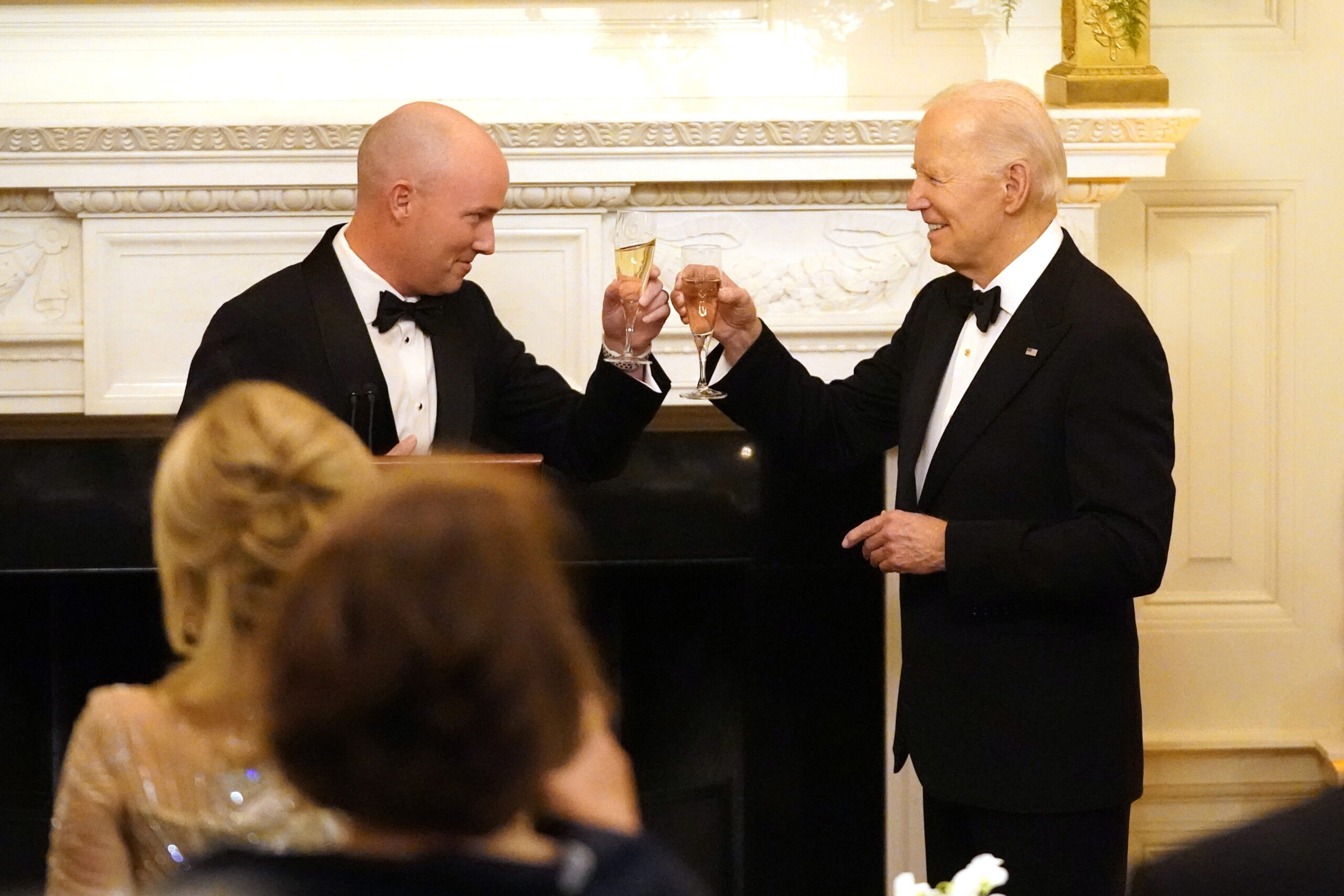 Utah Gov. Spencer Cox, left, and President Joe Biden toast before Biden speaks to members of the Na...