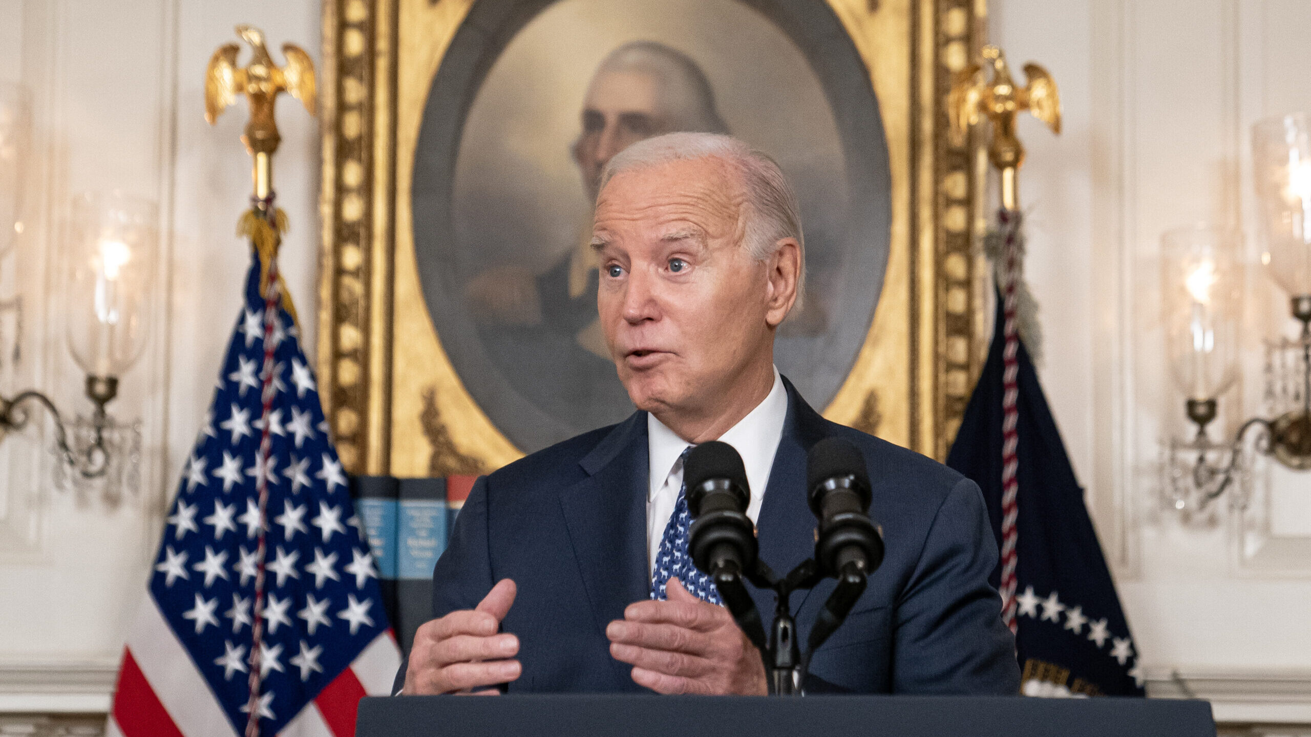 U.S. President Joe Biden delivers remarks in the Diplomatic Reception Room of the White House on Fe...