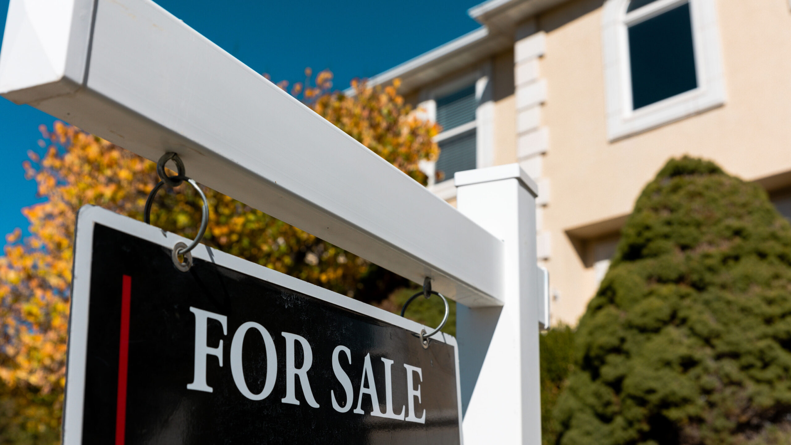 FILE: A "For sale" sign in front of a home in North Salt Lake on Monday, Oct. 30, 2023....