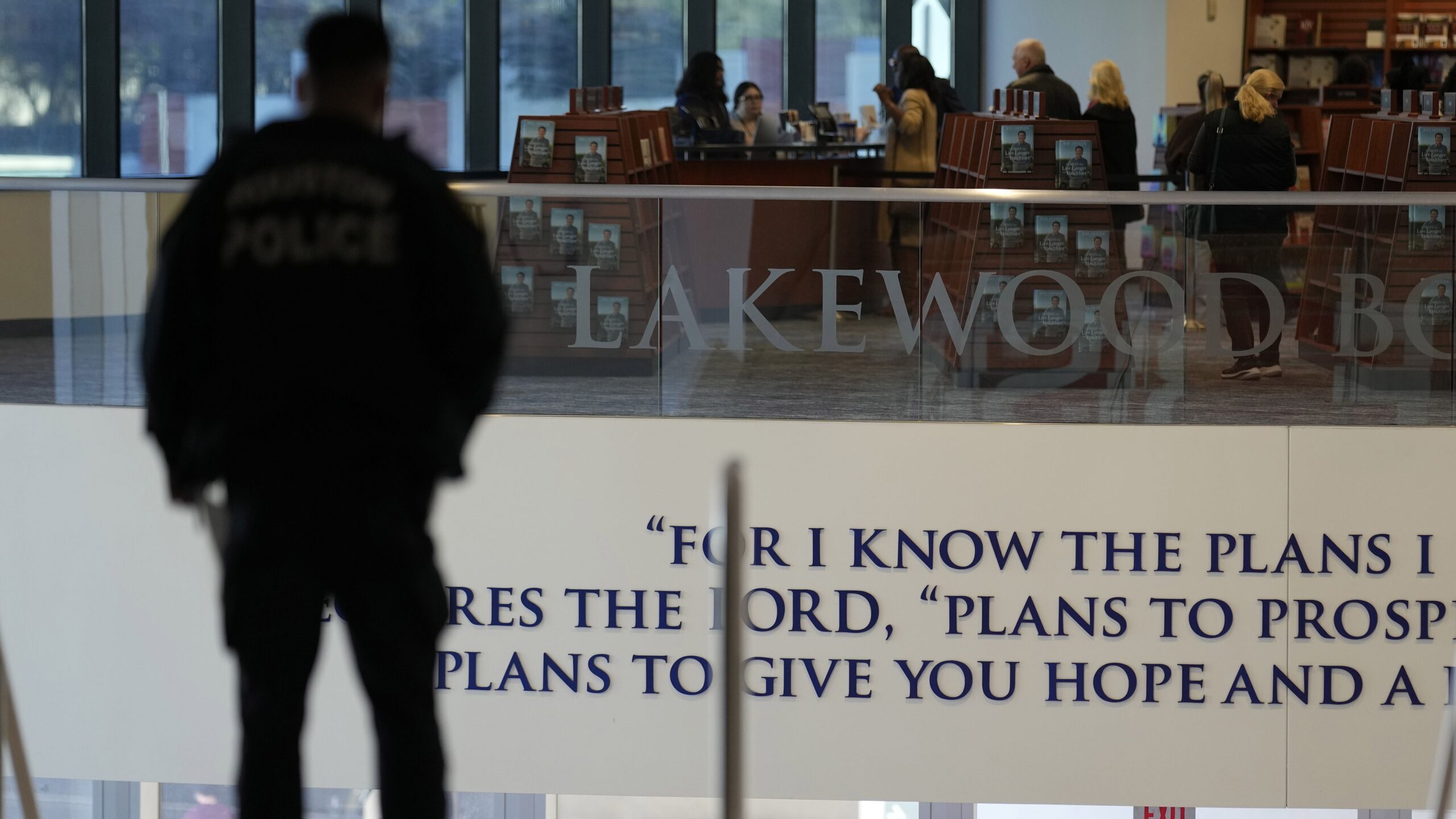 A police officer stands inside Lakewood Church, Sunday, February 18, in Houston....