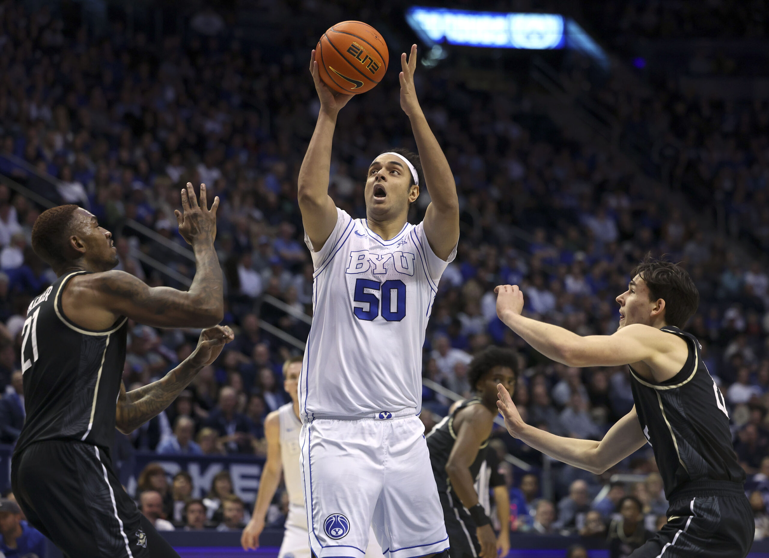 Brigham Young Cougars center Aly Khalifa (50) shoots against the UCF Knights at the Marriott Center...