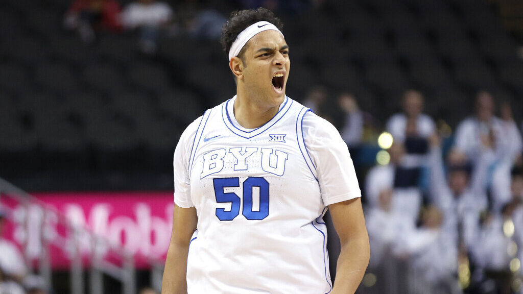 Brigham Young Cougars center Aly Khalifa (50) celebrates a 3-pointer during the Big 12 conference t...