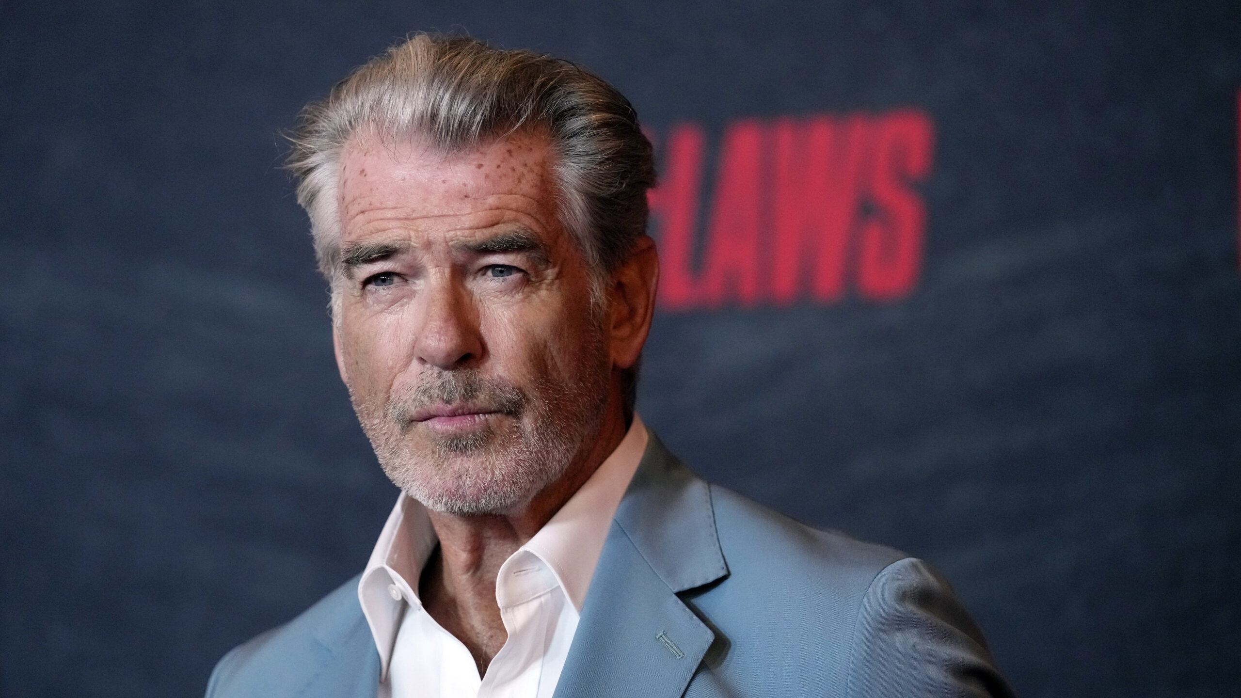 Pierce Brosnan, a cast member in "The Out-Laws," poses at a special screening of the film, June 26,...