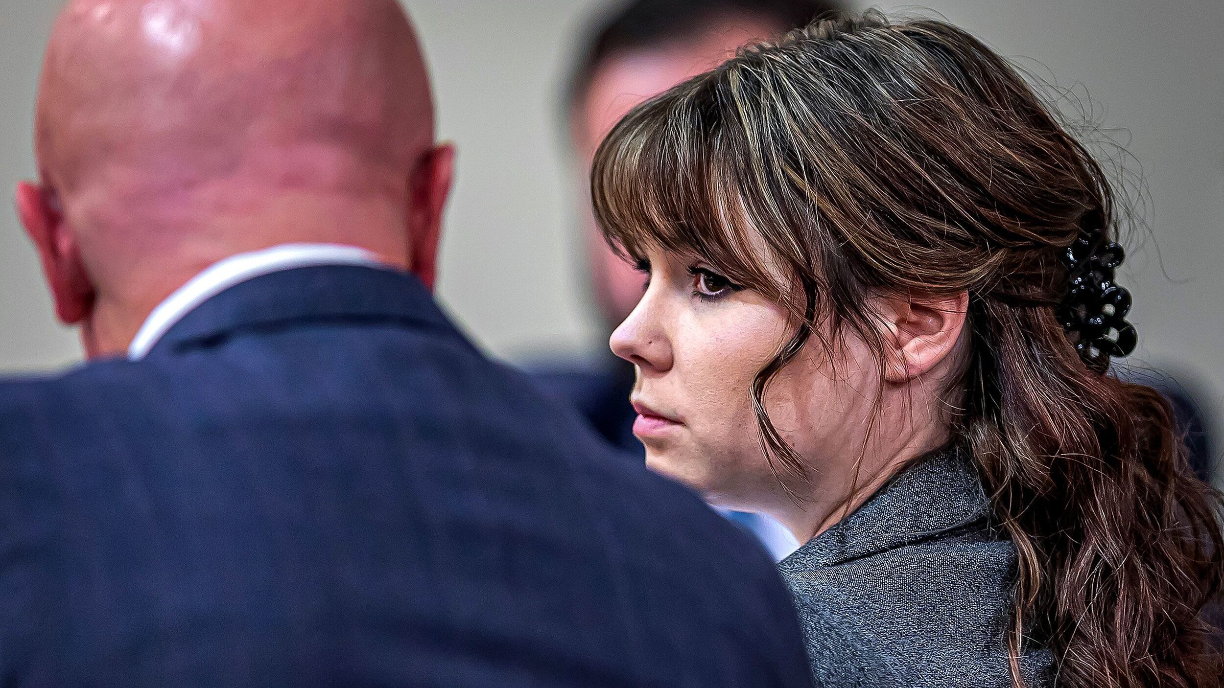 Hannah Gutierrez-Reed confers with her attorney Jason Bowles during opening arguments in Judge Mary...