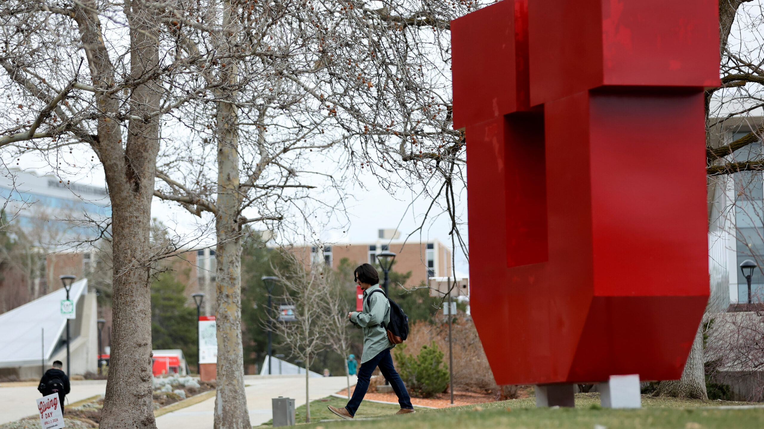People walk through the University of Utah campus in Salt Lake City on Wednesday, March 13, 2024....