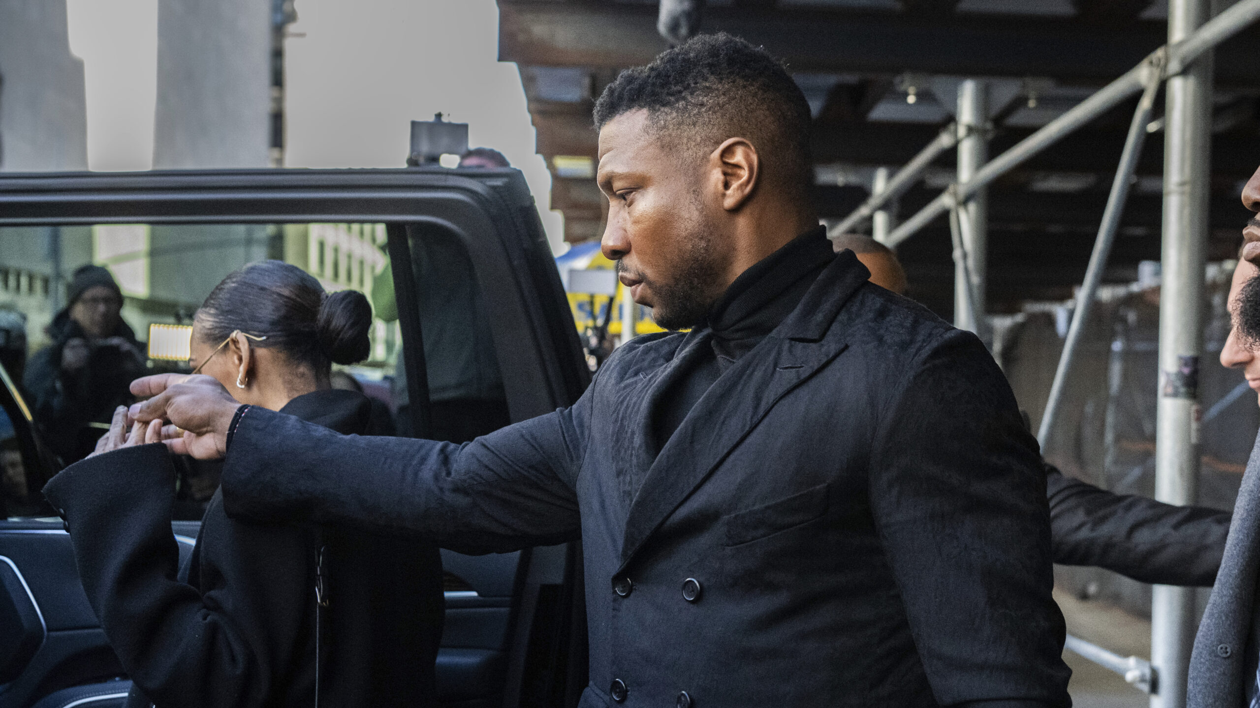 Actor Jonathan Majors leaves Criminal Court with his girlfriend Megan Good after his sentencing in ...