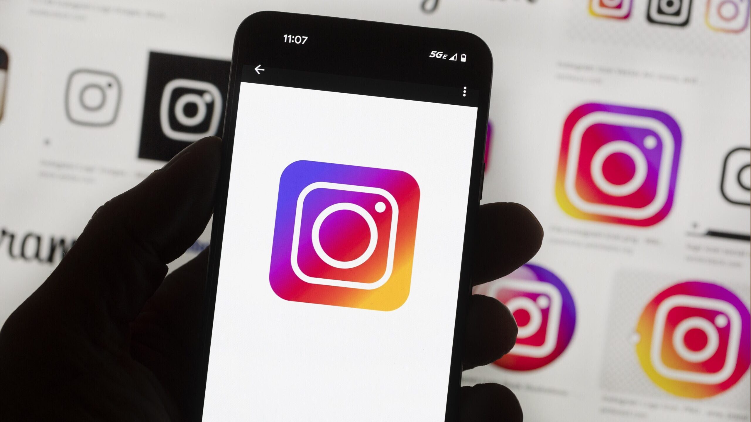 The Instagram logo is seen on a cell phone in Boston, USA, Oct. 14, 2022....