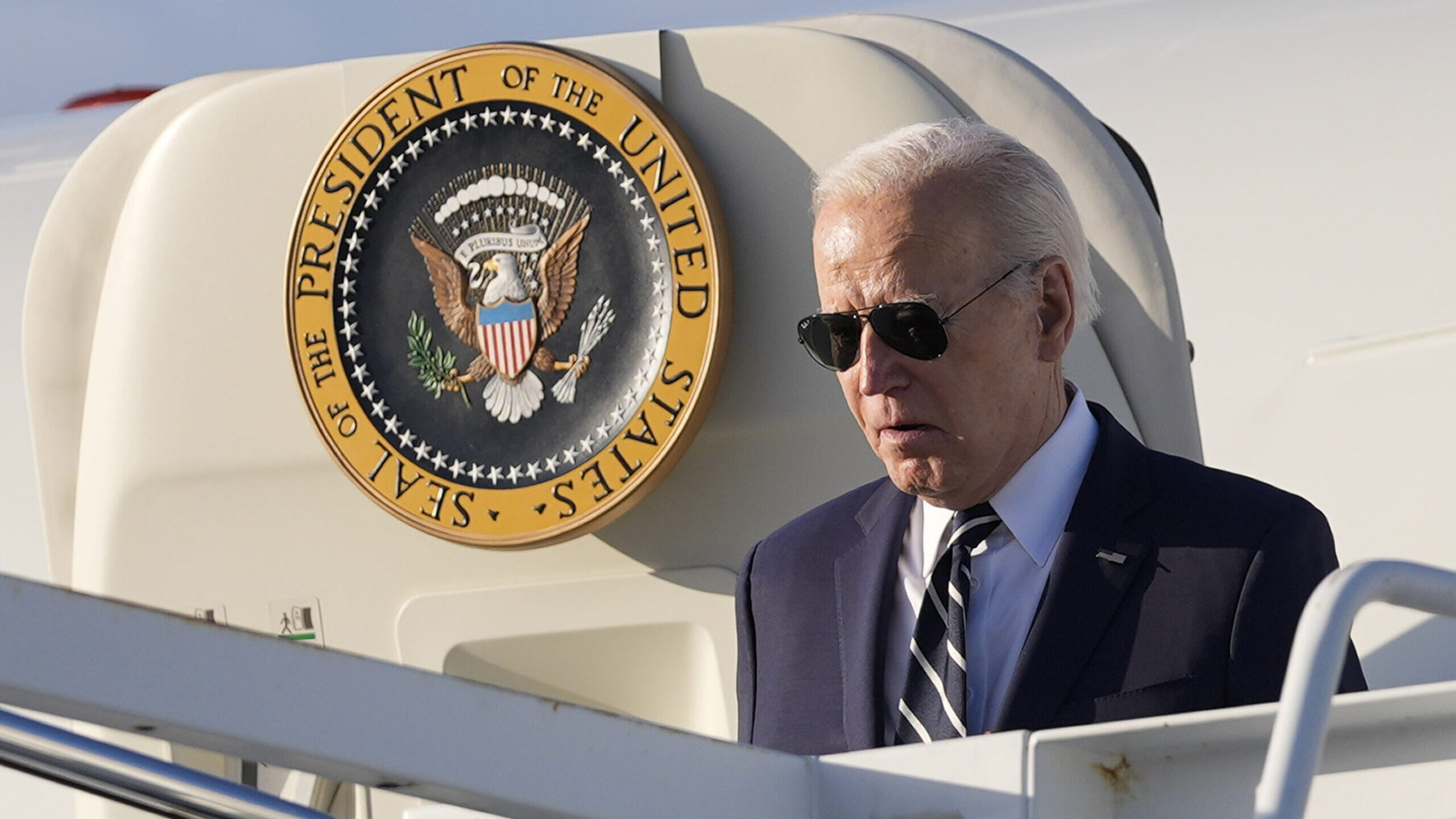 President Joe Biden boarding Air Force One at Andrews Air Force Base, Md., Friday, April 12, 2024, ...
