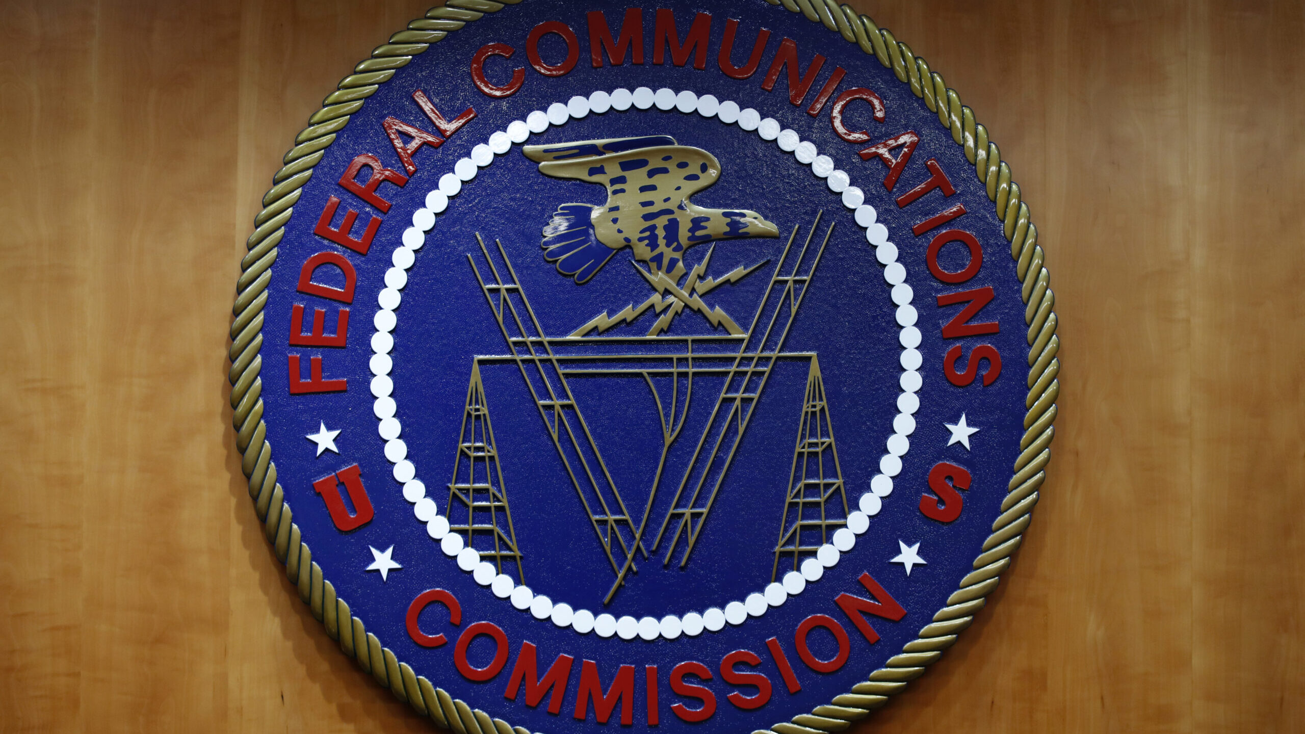 The seal of the Federal Communications Commission (FCC) is seen before an FCC meeting to vote on ne...