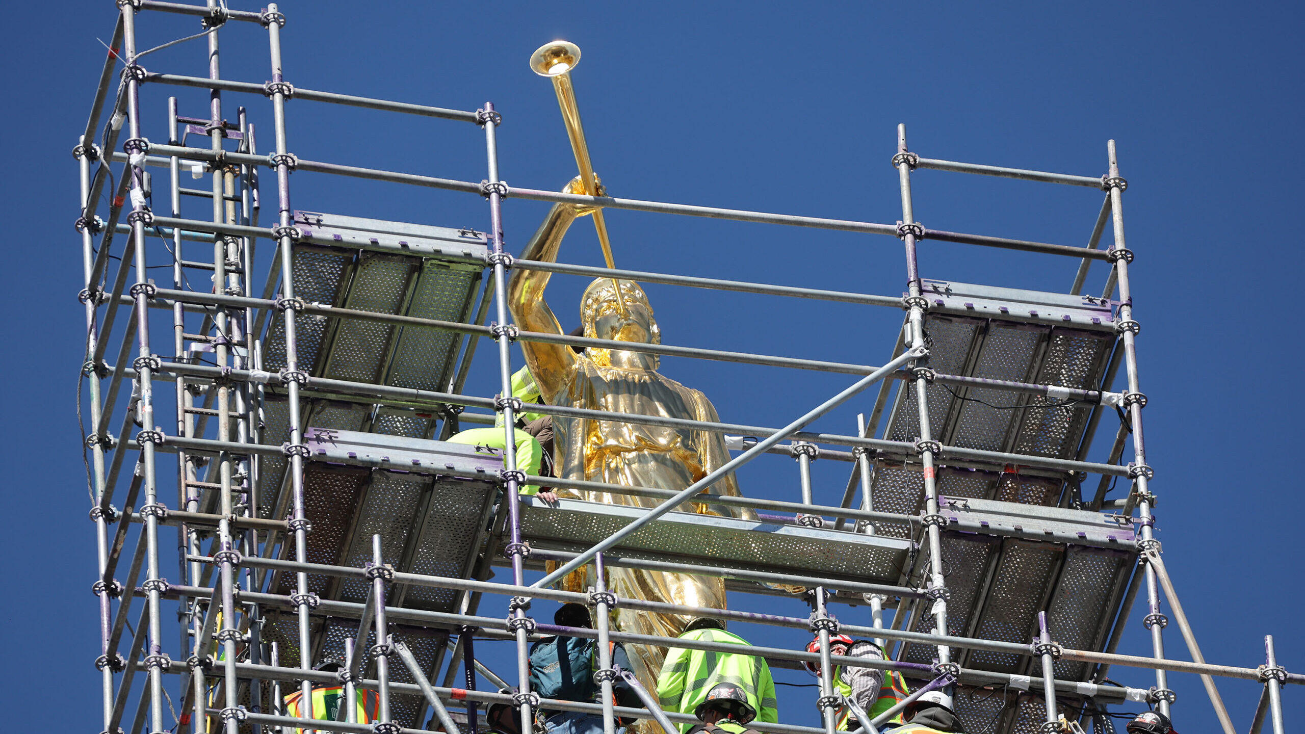 angel moroni statue returned to top of temple...