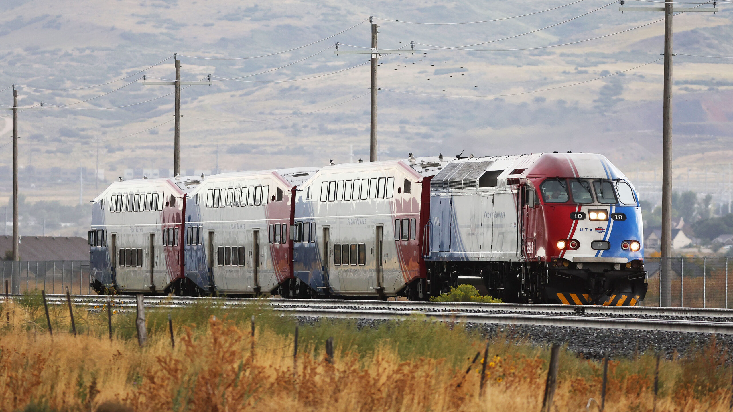 A Utah Transit Authority FrontRunner travels near Point of the Mountain in Bluffdale....