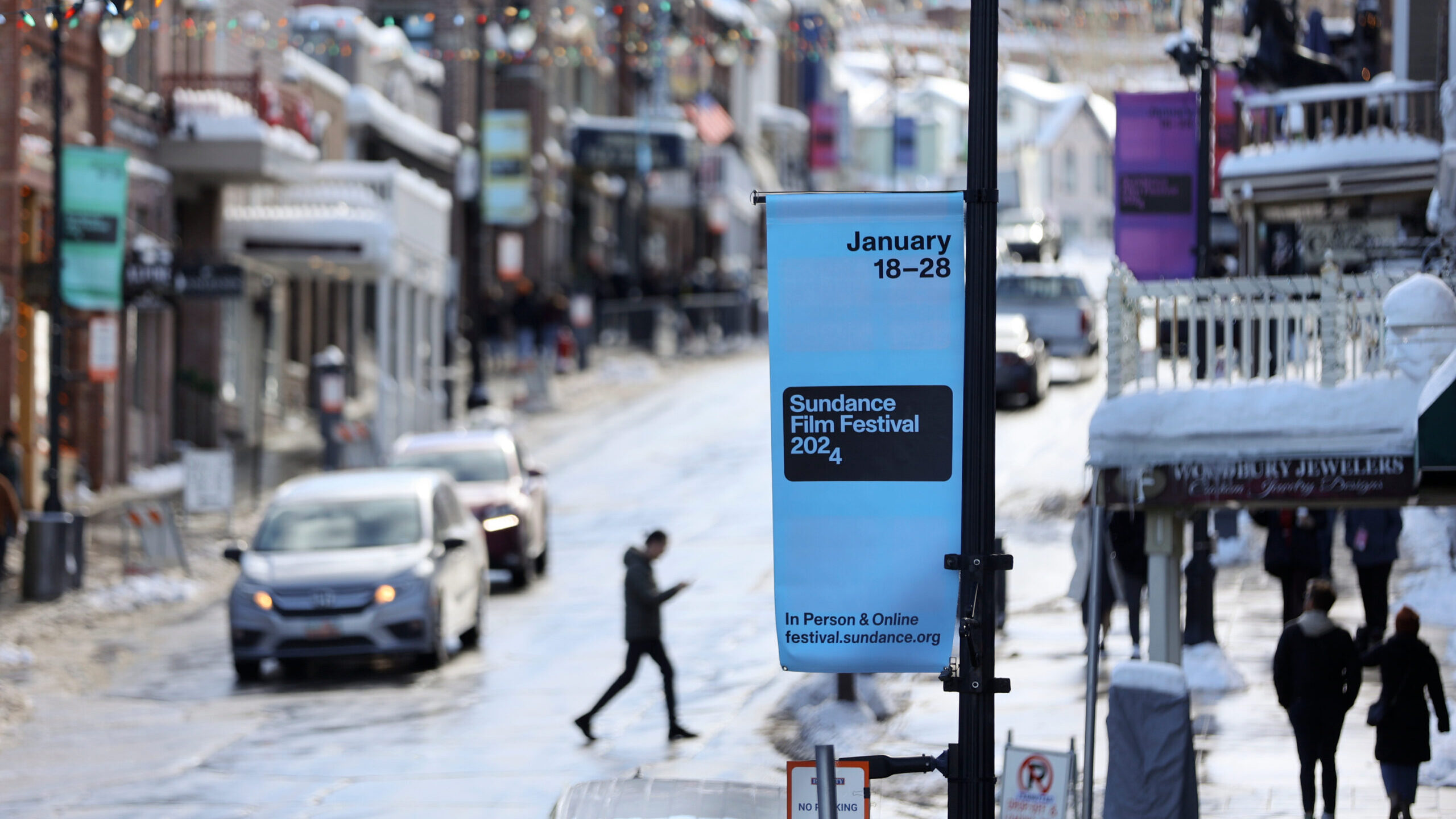 Signs are posted for the 2024 Sundance Film Festival on Main Street in Park City on Thursday, Jan. ...