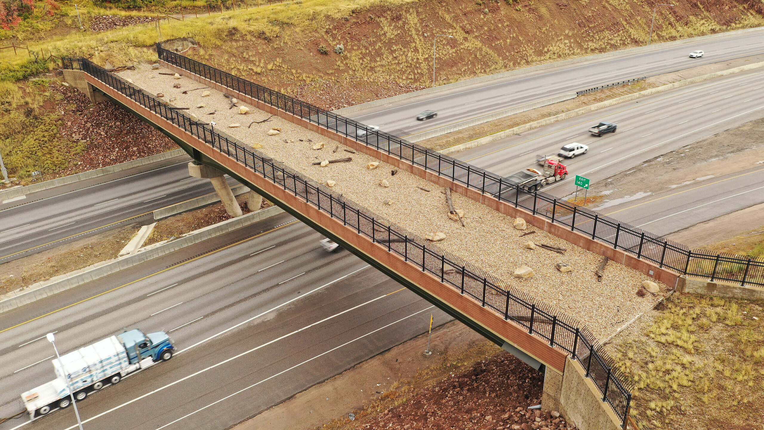 Motorists travel under a wildlife crossing bridge spanning I-80 in Parleys Canyon on Tuesday, Oct. ...