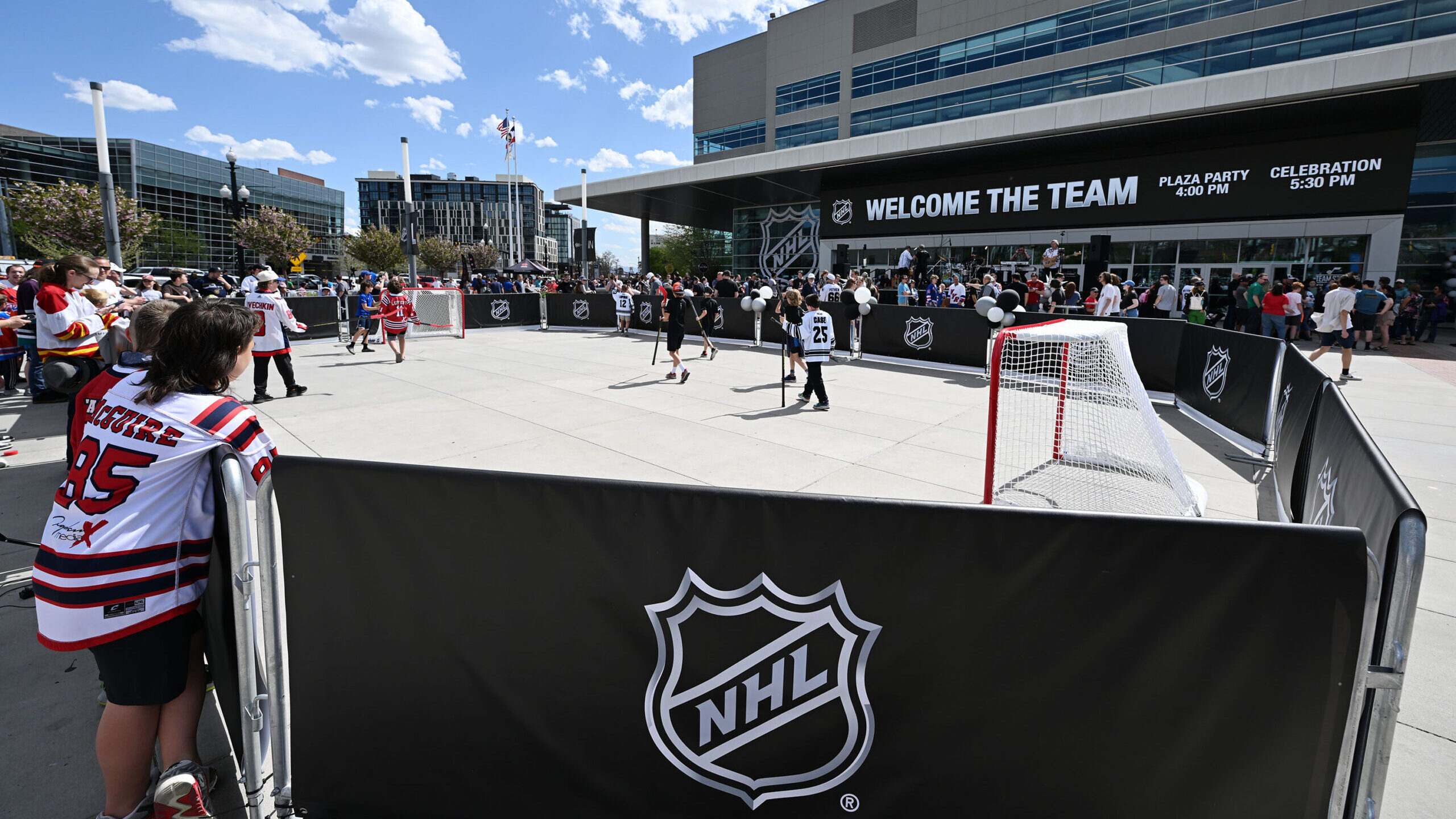 Kids play street hockey ahead of the doors opening as thousands attend the NHL event at the Delta C...