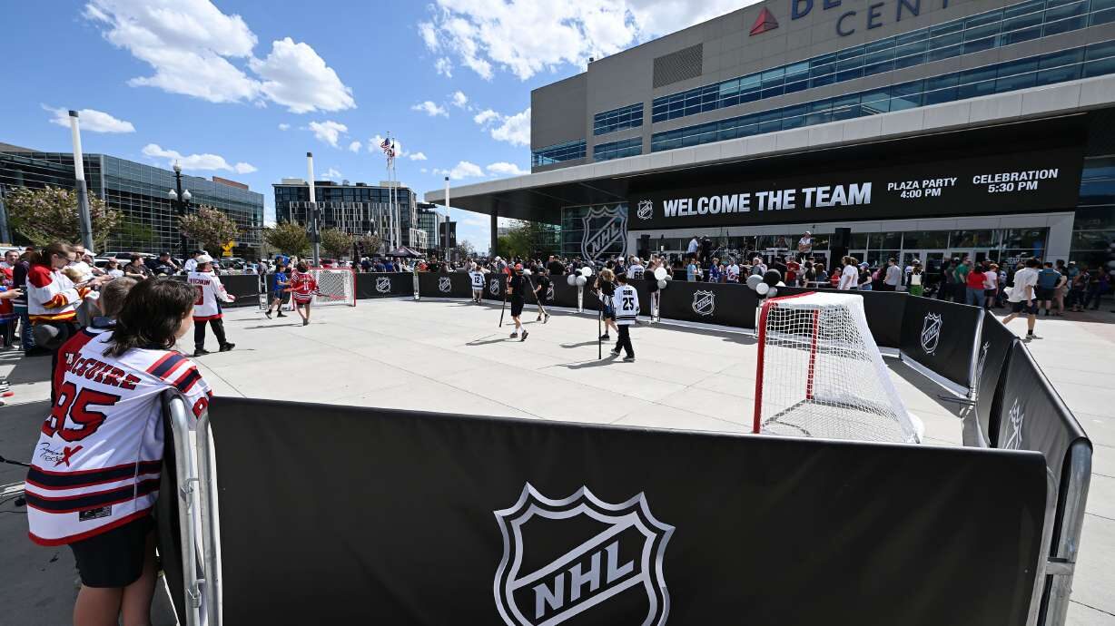 Kids play street hockey ahead of the doors opening as thousands attend the NHL event at the Delta C...