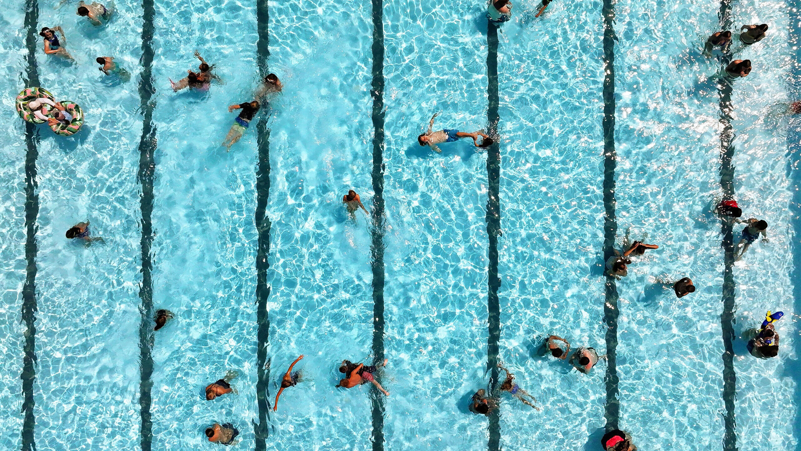 Swimmers cool off in the pool at the Cottonwood Heights Recreation Center in Cottonwood Heights on ...