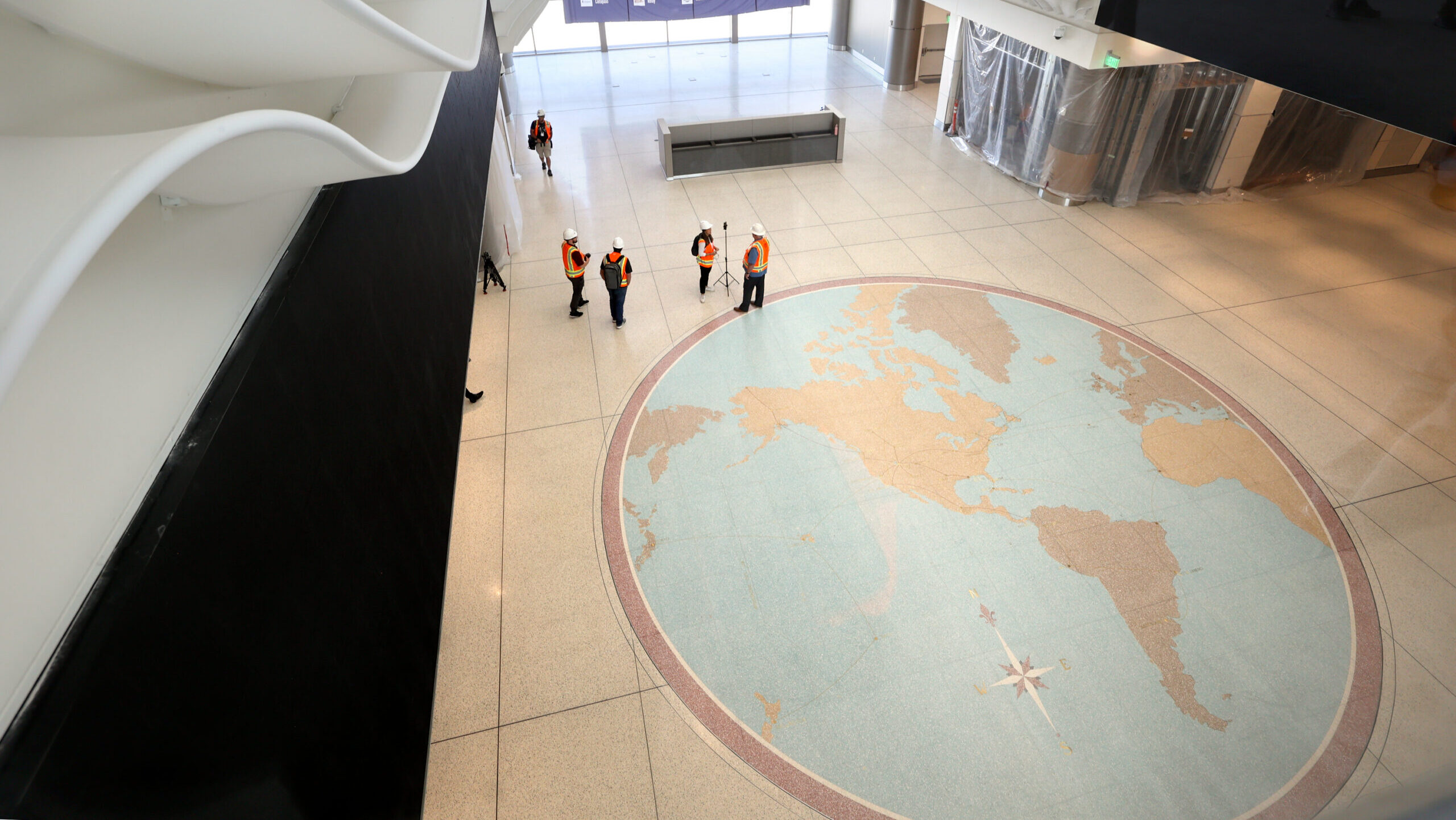 Famous world map preserved in new airport home