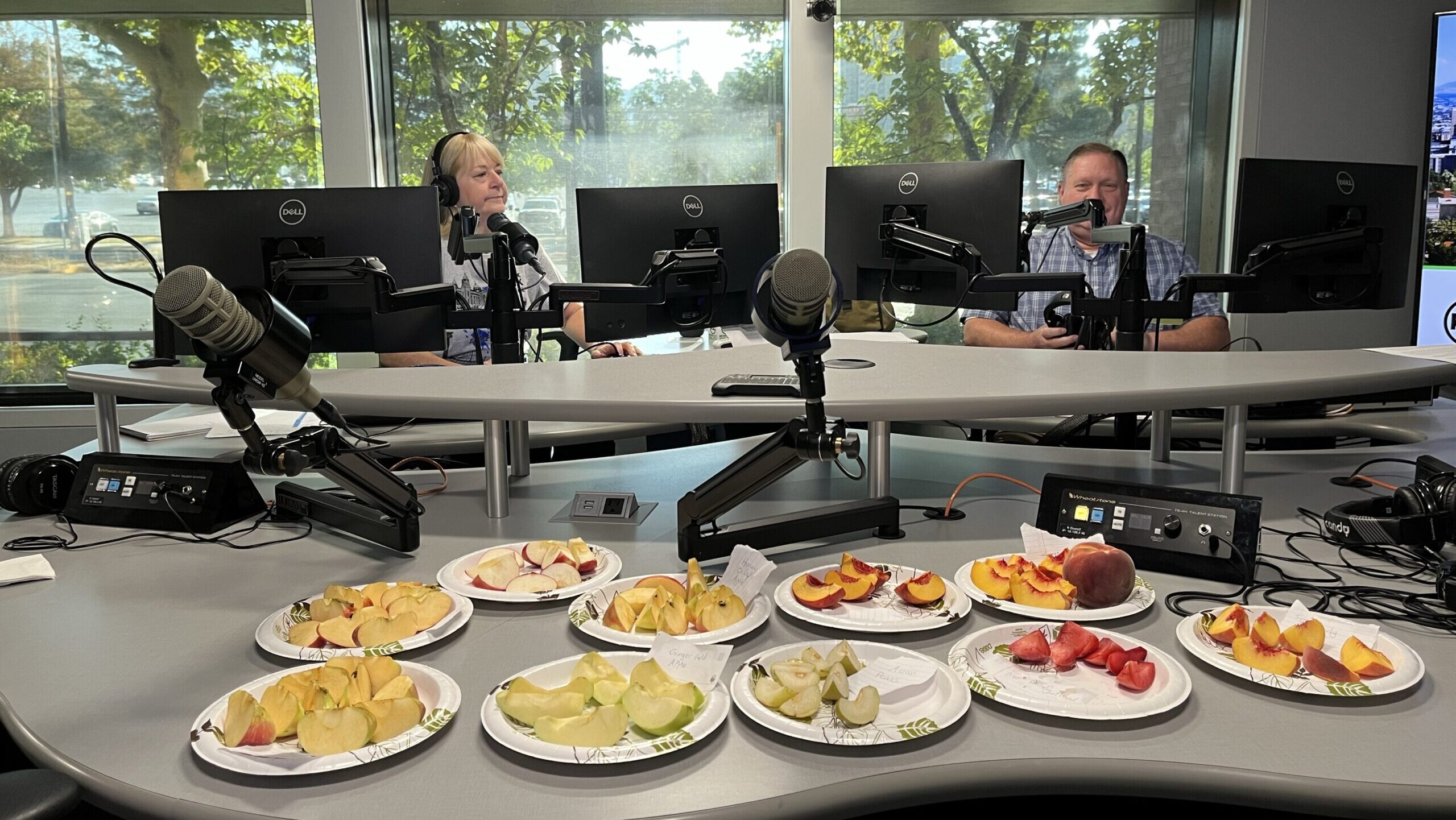 Bowls of sliced apples are laid out for the team of the KSL Greenhouse Show...