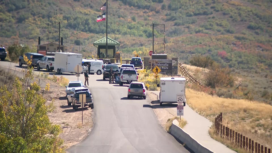 Police agencies at the north entrance of the Jordanelle State Park investigating a found dead man. ...