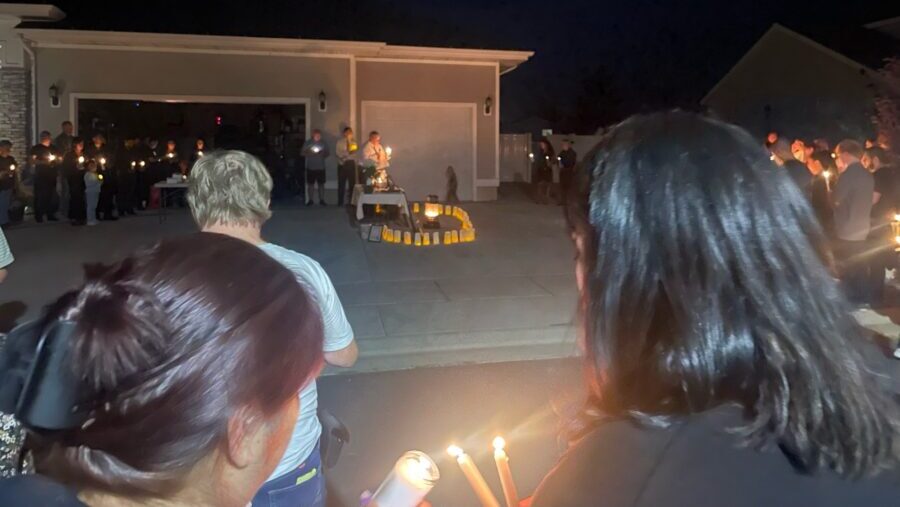 Close relatives and neighbors of a family who died in a tragic murder-suicide mourned together and ...